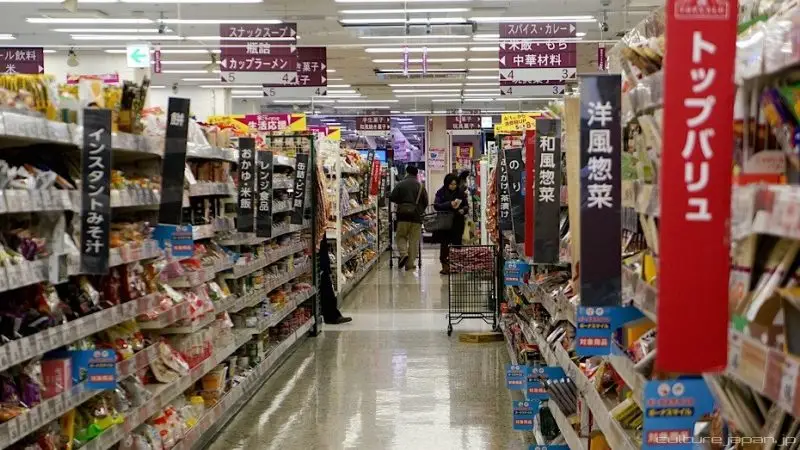 Shopping at a Japanese supermarket Aisle view inside a typical Japanese supermarket with labeled shelves
