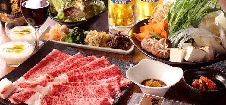 Sukiyaki - Origin, Curiosities, and Recipe Sukiyaki in a bowl with meat and vegetables