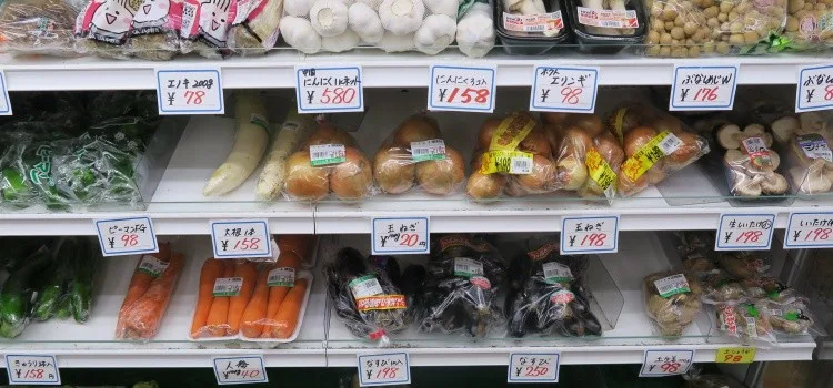 Fresh fruit and vegetables displayed at a local market in Japan