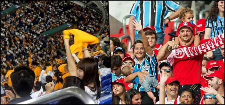 Torcida organizada em estádio de futebol Torcedores organizados em arquibancada durante partida de futebol