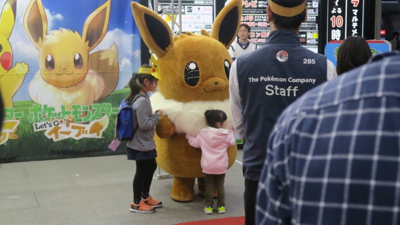 Sisters in Japanese — ane and onee-chan Two sisters hugging a Pokémon together