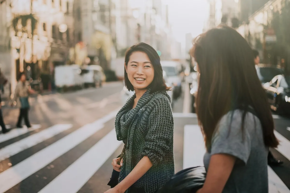 Two japanese women around in Tokyo during daytime. Making shoppi